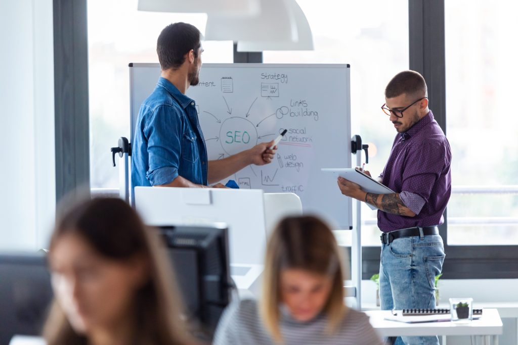 Small business owner achieving success in local search rankings with AI-driven solutions